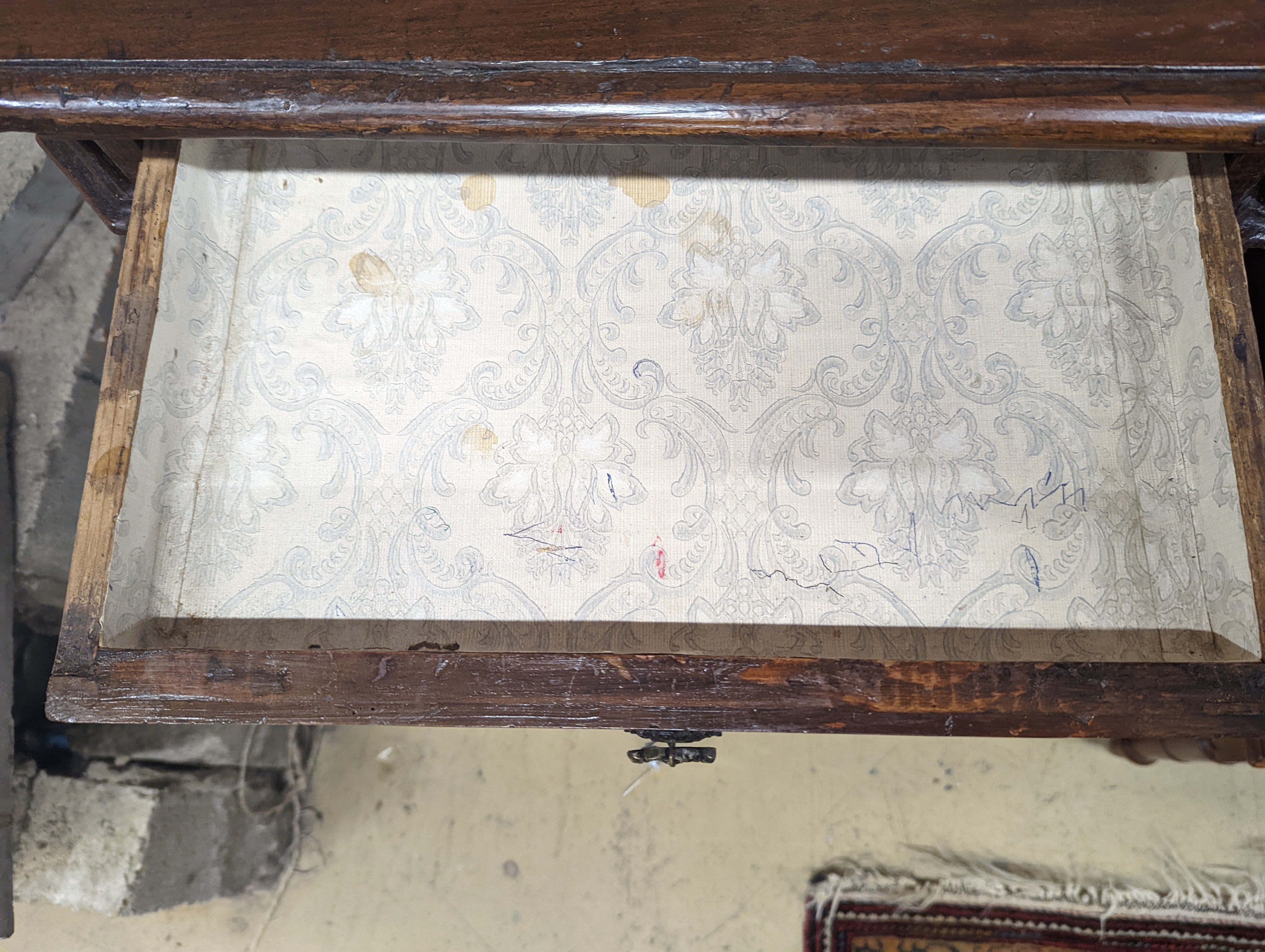 An 18th century North Italian walnut four drawer chest, width 65cm, depth 33cm, height 79cm
